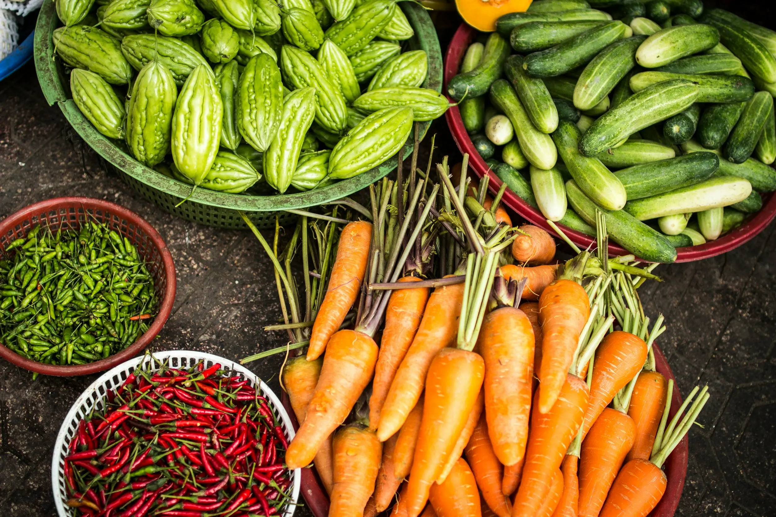 An assorted bundle of fresh vegetables from a managed farmland harvest near Ranchi